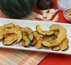 Roasted Acorn Squash with Garlic and Pepitas