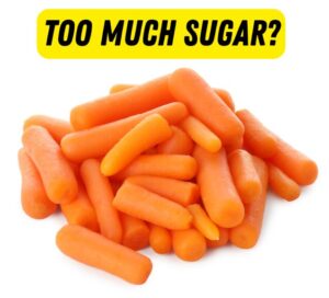 Photo of a bunch of baby carrots with the caption "TOO MUCH SUGAR?"